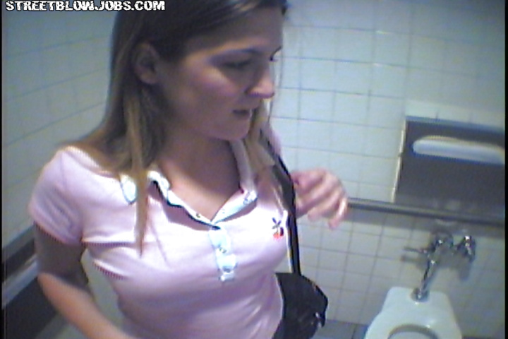 Sexy brunette is giving deep blowjob in public toilet